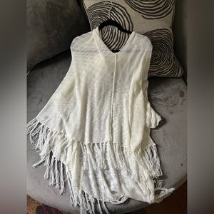 En Crème hooded fringe poncho